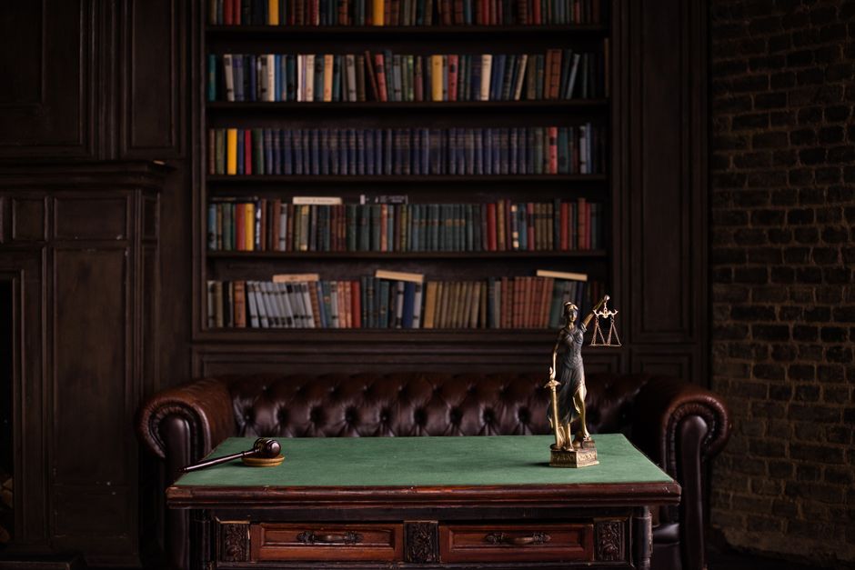 Law books and a gavel representing justice